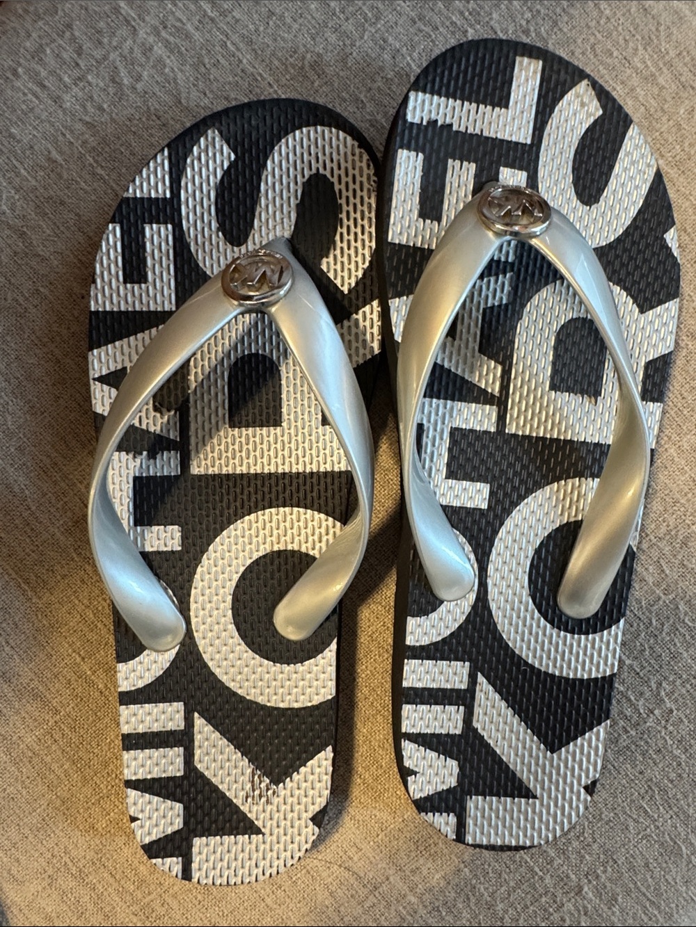 Michael Kors Silver Strap Flip Flops with Black & White Graphic Footbed